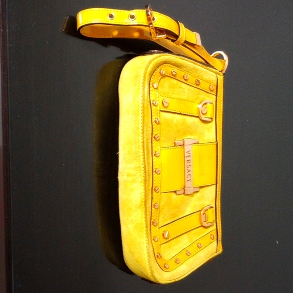 Beautiful and chic Versace wristlet/ clutch in light green